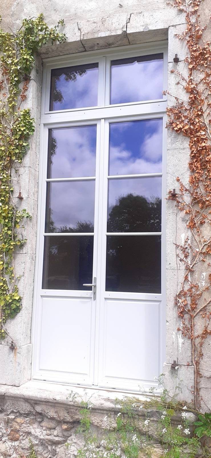 Rénovation de fenêtres bois Bâtiments de France en Ariège